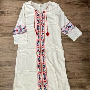 Peek youth dress with embroidery.